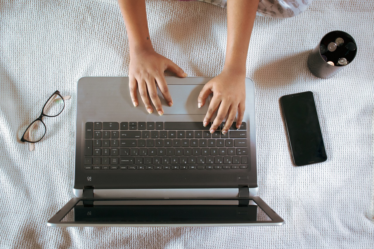 how to get stickers off laptops